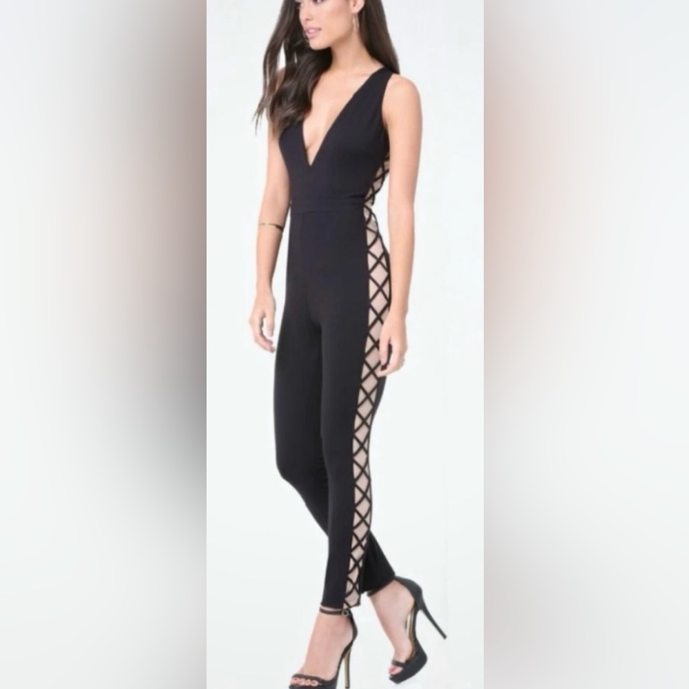 Elegant Black Jumpsuit with Side Cutouts with nude color fabric under it